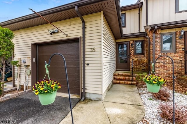 entrance to property featuring board and batten siding
