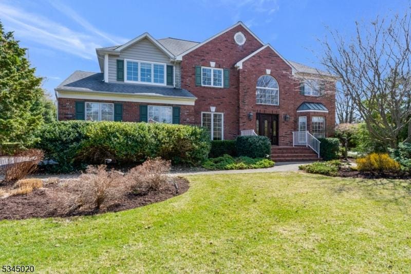 3 Hardwood Ct, Warren Twp, NJ 07059 - view of front of home featuring a front yard and brick siding