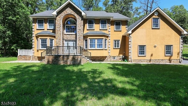 1121 N Washington Ave, Green Brook Twp, NJ 08812 - rear view of property featuring a yard and stucco siding