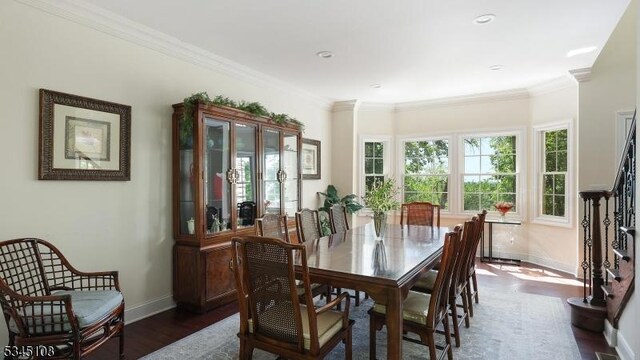 1121 N Washington Ave, Green Brook Twp, NJ 08812 - dining area featuring baseboards, dark wood-type flooring, and ornamental molding