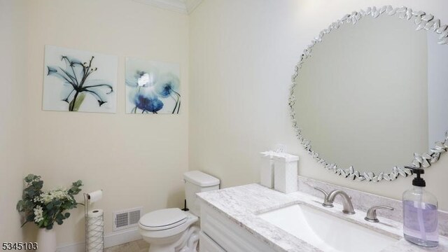 1121 N Washington Ave, Green Brook Twp, NJ 08812 - half bathroom with toilet, vanity, and crown molding