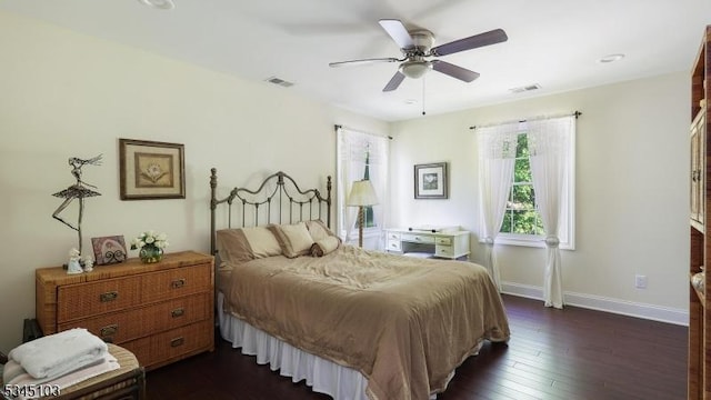 1121 N Washington Ave, Green Brook Twp, NJ 08812 - bedroom featuring baseboards, dark wood-style flooring, and a ceiling fan