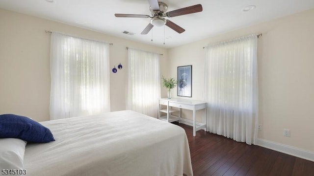 1121 N Washington Ave, Green Brook Twp, NJ 08812 - bedroom with multiple windows, hardwood / wood-style flooring, baseboards, and ceiling fan