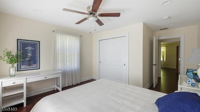 1121 N Washington Ave, Green Brook Twp, NJ 08812 - bedroom with dark wood-style floors, baseboards, a ceiling fan, and a closet
