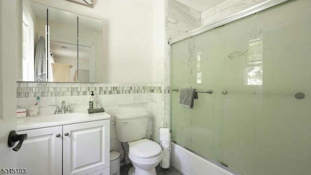 1121 N Washington Ave, Green Brook Twp, NJ 08812 - bathroom with tile walls, toilet, and vanity