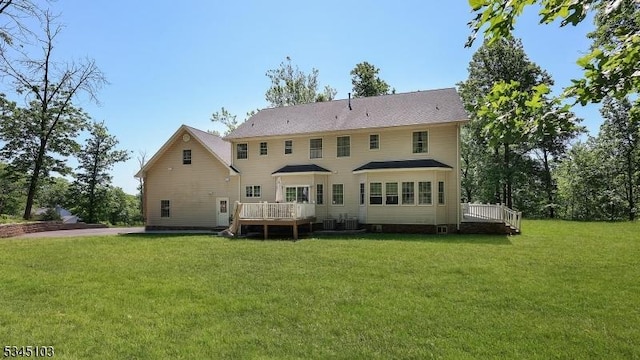 1121 N Washington Ave, Green Brook Twp, NJ 08812 - back of property featuring a deck and a yard