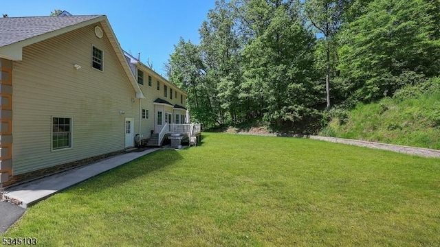1121 N Washington Ave, Green Brook Twp, NJ 08812 - view of grassy yard featuring a deck