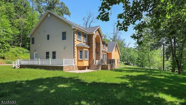 1121 N Washington Ave, Green Brook Twp, NJ 08812 - back of house featuring a yard and a deck