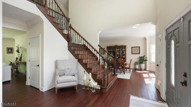1121 N Washington Ave, Green Brook Twp, NJ 08812 - foyer featuring stairway, hardwood / wood-style flooring, ornamental molding, baseboards, and a towering ceiling