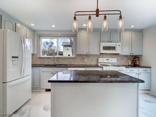 kitchen featuring recessed lighting, marble finish floor, a sink, and white appliances