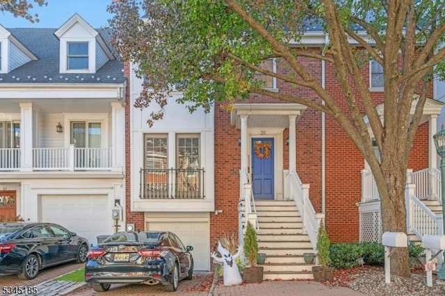26 Half Moon Isle, Jersey City, NJ 07305 - view of property with an attached garage and brick siding