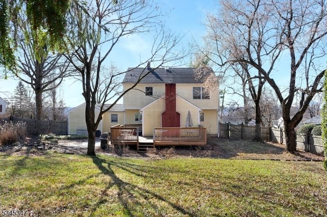 113 Circle Dr S, West Amwell Twp, NJ 08530 - rear view of house featuring a fenced backyard, a wooden deck, and a lawn
