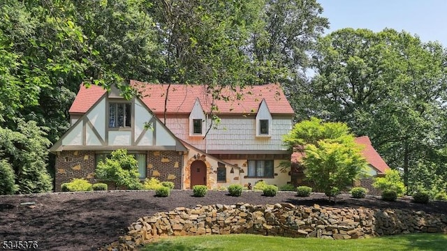 11 Stoningham Dr, Warren Twp, NJ 07059 - tudor-style house featuring stone siding
