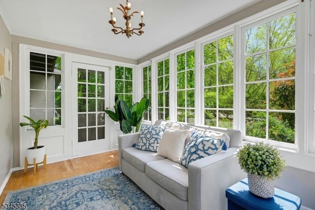 110 Kenilworth Rd, Mountain Lakes Boro, NJ 07046 - sunroom / solarium featuring a chandelier, wood finished floors, and healthy amount of natural light