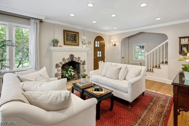 110 Kenilworth Rd, Mountain Lakes Boro, NJ 07046 - living area featuring arched walkways, plenty of natural light, crown molding, wood finished floors, and recessed lighting