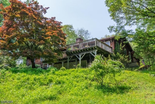992 Stillwater Rd, Stillwater Twp, NJ 07860 - back of house featuring a deck and a chimney