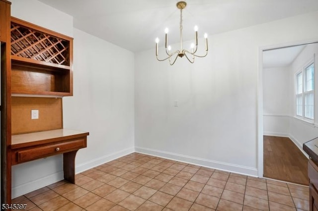 6 Ronarm Dr, Mountain Lakes Boro, NJ 07046 - unfurnished dining area with a chandelier and baseboards