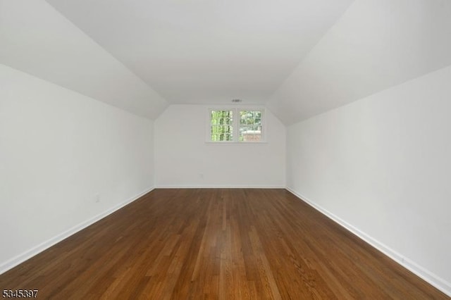 6 Ronarm Dr, Mountain Lakes Boro, NJ 07046 - additional living space featuring dark wood-style flooring, lofted ceiling, and baseboards