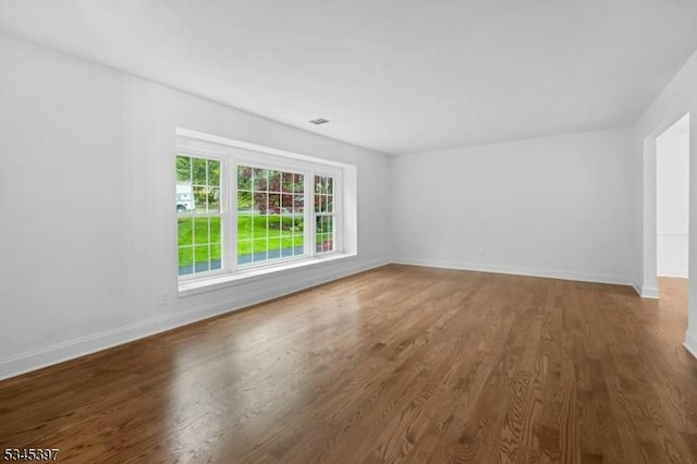 6 Ronarm Dr, Mountain Lakes Boro, NJ 07046 - empty room featuring wood finished floors and baseboards