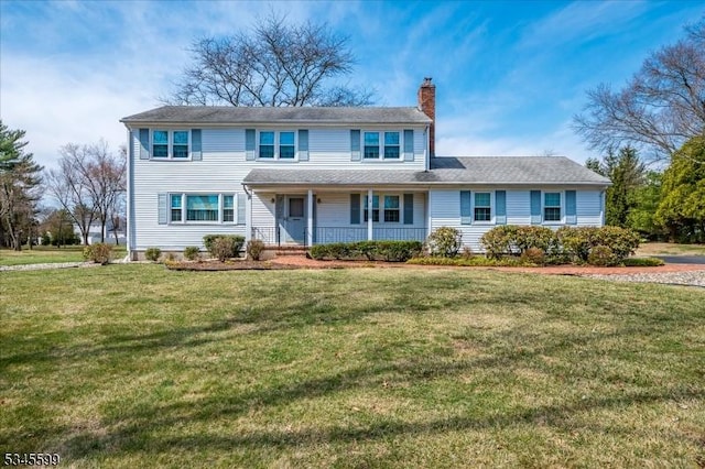 31 Riverview Ter, Hillsborough Twp, NJ 08844 - view of front facade featuring a front yard, a porch, and a chimney