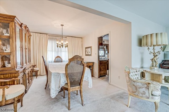 31 Riverview Ter, Hillsborough Twp, NJ 08844 - dining room featuring light colored carpet, baseboards, and a chandelier