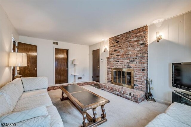 31 Riverview Ter, Hillsborough Twp, NJ 08844 - living area featuring visible vents, baseboards, carpet, and a fireplace