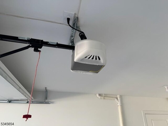 interior details featuring a garage door opener