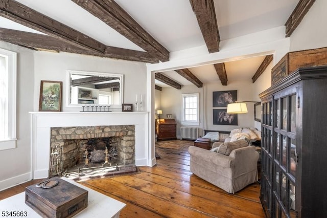 112 Pleasant Grove Rd, Washington Twp, NJ 07853 - living room with hardwood / wood-style flooring, baseboards, a fireplace, beam ceiling, and radiator