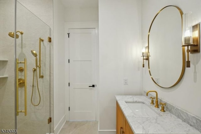 full bathroom with vanity and a shower stall