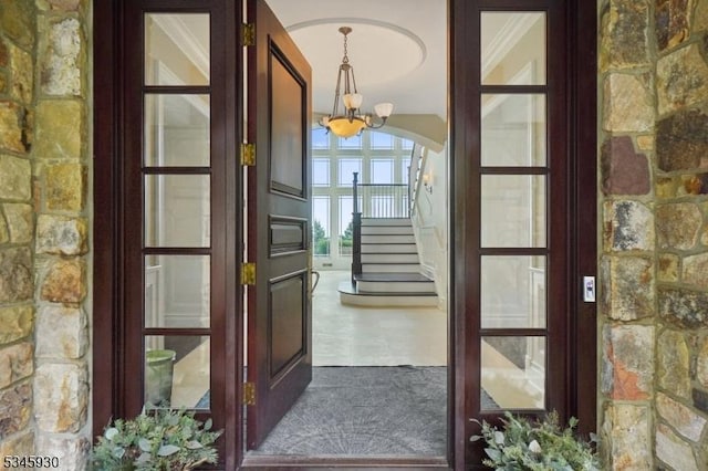 16 Laurel Mountain Way, Tewksbury Twp, NJ 07830 - interior space featuring arched walkways, stairs, and a chandelier