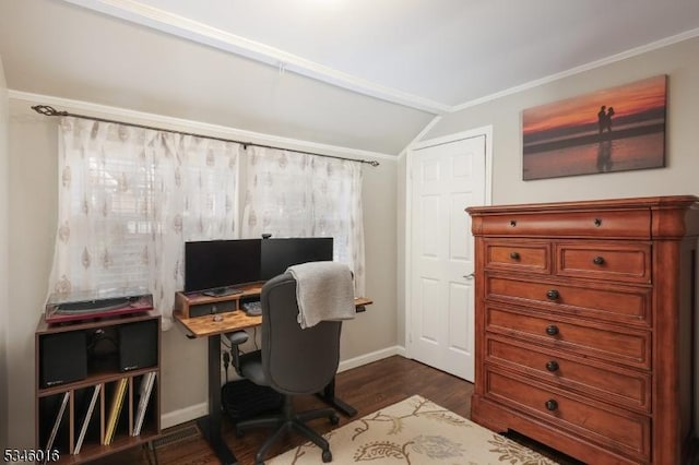 office with lofted ceiling, baseboards, dark wood-style flooring, and ornamental molding