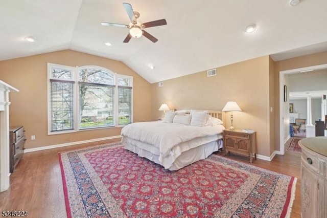 bedroom with visible vents, baseboards, and light wood-type flooring