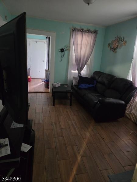 527 Valley St, City Of Orange Twp, NJ 07050 - living area featuring wood finished floors