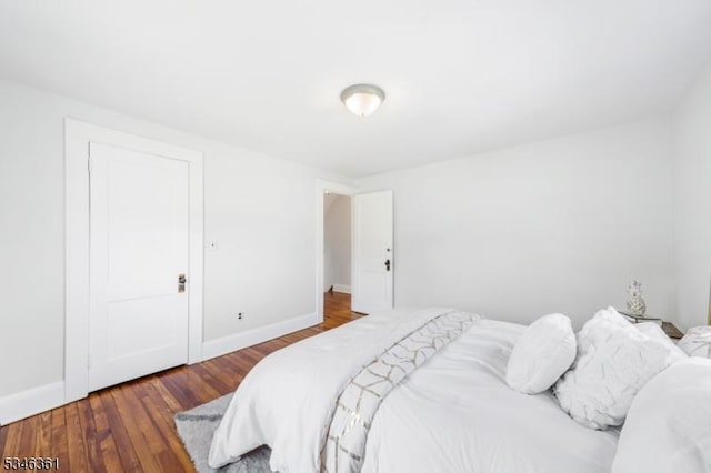 649 N Avenue Ext, Dunellen Boro, NJ 08812 - bedroom featuring hardwood / wood-style flooring and baseboards