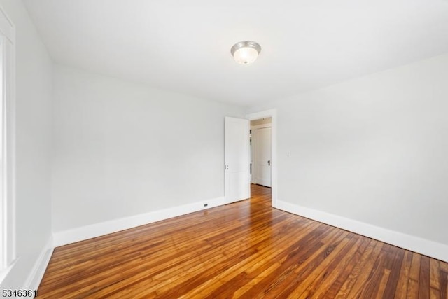 649 N Avenue Ext, Dunellen Boro, NJ 08812 - spare room with baseboards and wood finished floors
