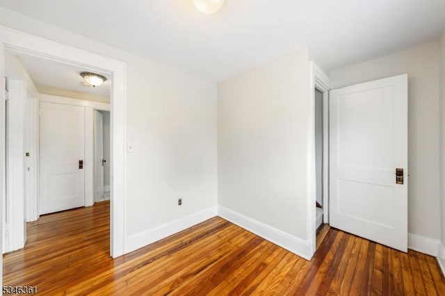 649 N Avenue Ext, Dunellen Boro, NJ 08812 - spare room featuring wood finished floors and baseboards