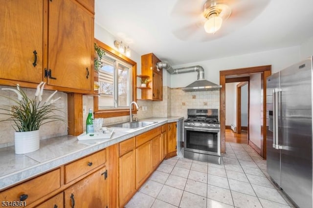 649 N Avenue Ext, Dunellen Boro, NJ 08812 - kitchen with stainless steel appliances, a sink, backsplash, and brown cabinets