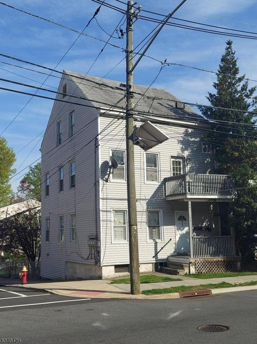 215 Valley Rd, Clifton City, NJ 07013 - view of front of property with a balcony