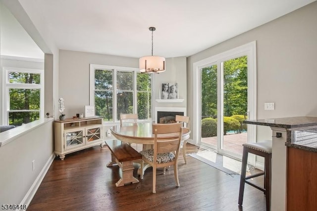 15 Wolfe Run Ct, Washington Twp, NJ 07853 - dining space with healthy amount of natural light, a chandelier, and dark wood-type flooring