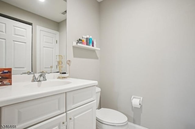 15 Wolfe Run Ct, Washington Twp, NJ 07853 - bathroom featuring vanity, toilet, and baseboards