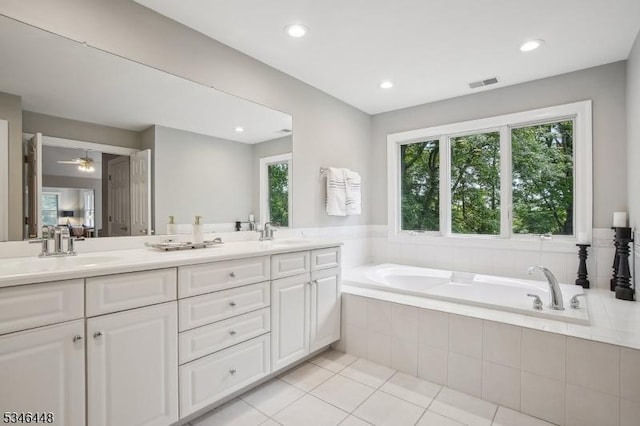 15 Wolfe Run Ct, Washington Twp, NJ 07853 - full bath featuring double vanity, a bath, tile patterned flooring, and recessed lighting