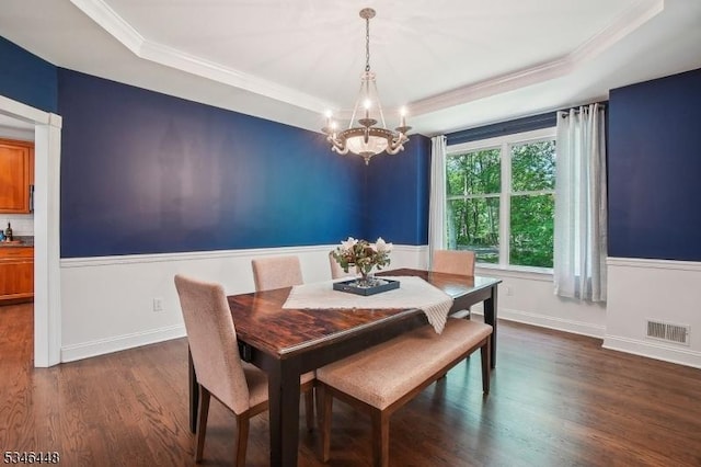 15 Wolfe Run Ct, Washington Twp, NJ 07853 - dining space with a raised ceiling, a chandelier, dark wood finished floors, ornamental molding, and baseboards