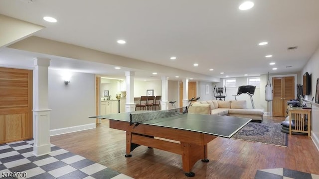 game room with light wood-style flooring, recessed lighting, baseboards, ornate columns, and visible vents
