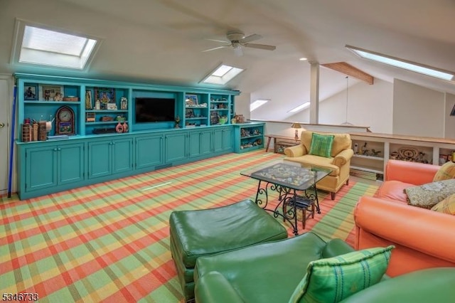 playroom featuring a ceiling fan, light carpet, and lofted ceiling with skylight