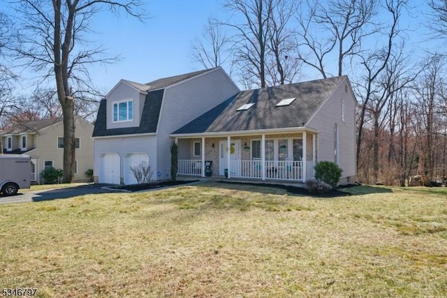 100 Toner Rd, Boonton Town, NJ 07005 - view of front facade with aphalt driveway, a garage, a front lawn, and a porch