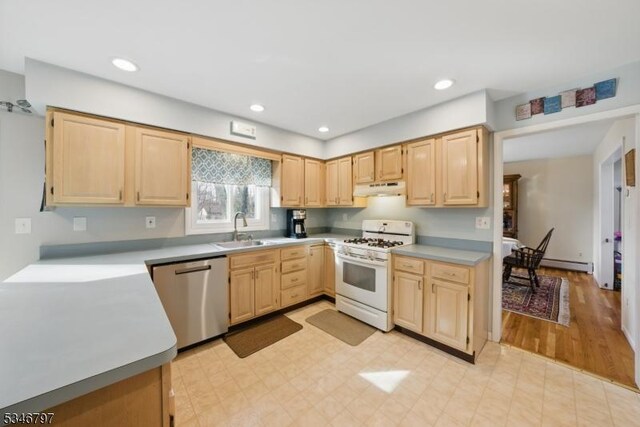 100 Toner Rd, Boonton Town, NJ 07005 - kitchen with white range with gas cooktop, under cabinet range hood, stainless steel dishwasher, a sink, and light brown cabinets