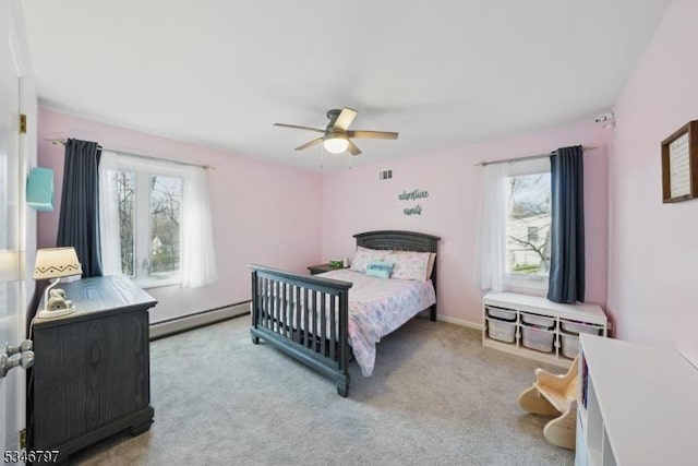 100 Toner Rd, Boonton Town, NJ 07005 - bedroom with a baseboard radiator, a ceiling fan, carpet, and multiple windows