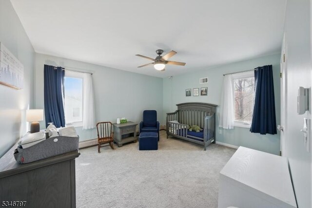 100 Toner Rd, Boonton Town, NJ 07005 - carpeted bedroom with a ceiling fan, baseboard heating, baseboards, and visible vents