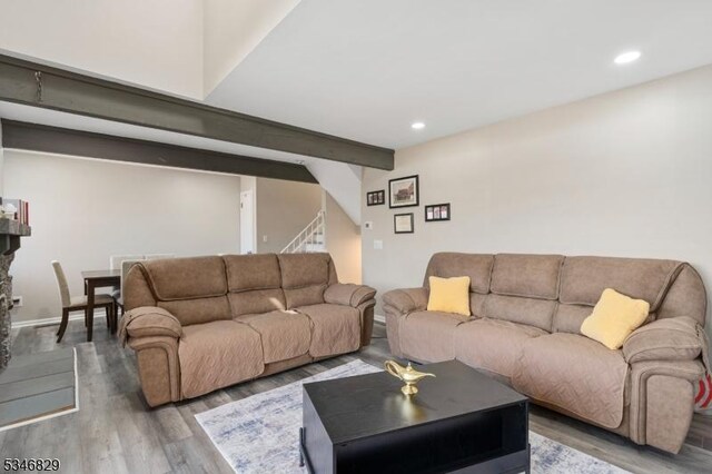 4 Village Way Unit 3, Vernon Twp, NJ 07462 - living room with recessed lighting, stairway, beamed ceiling, and wood finished floors