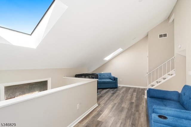 4 Village Way Unit 3, Vernon Twp, NJ 07462 - bonus room with baseboards, visible vents, wood finished floors, and lofted ceiling with skylight